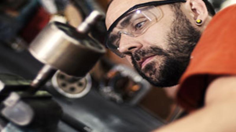 Manufacturing engineer working with tools