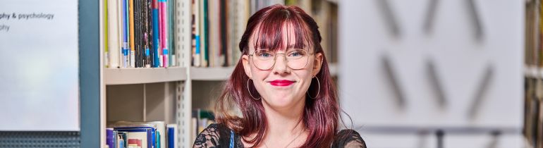Female Psychology student smiling at camera