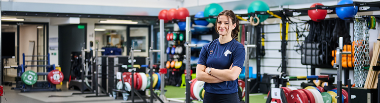 Student standing in Walsall sports gym